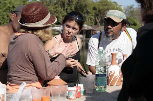Catherine talks with other participants at the International Symposium in Cuba, 2008